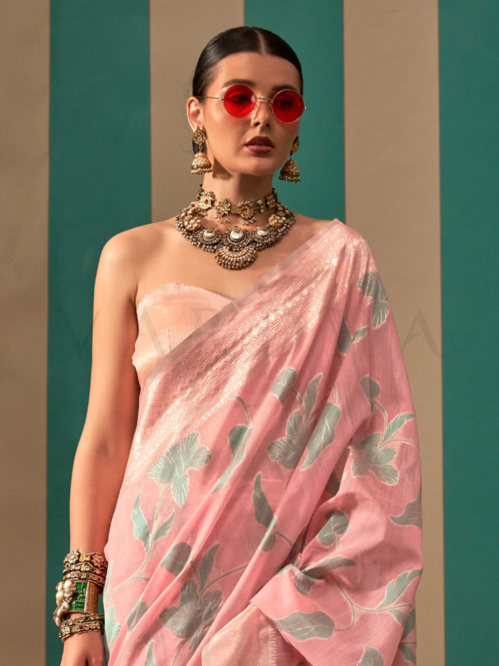 Baby Pink and Sky Blue linen saree with floral woven motifs and soft handloom texture This image captures the side angle view showcasing blouse styling and zari border detail, ideal for visualizing festive elegance, designer appeal, and modern styling inspiration. Perfect for online shoppers seeking detailed previews before purchase, enhancing saree visual merchandising and SEO-rich product display strategy.