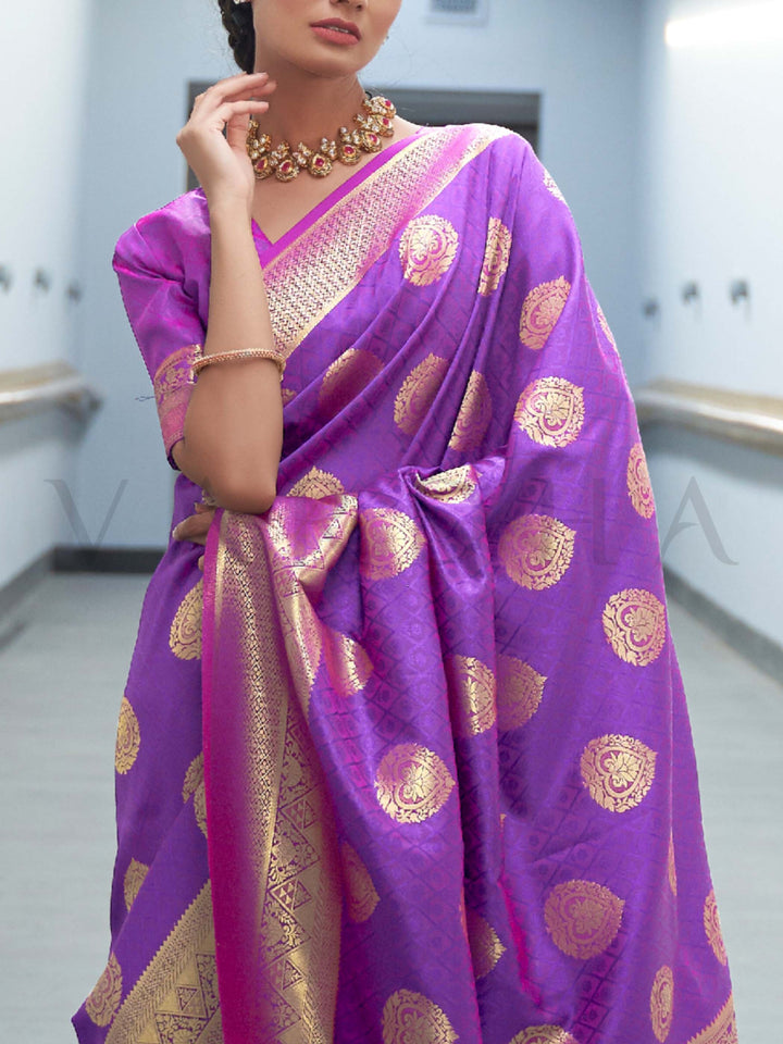 This Royal Purple–Rani Pink Satin Silk saree is crafted with intricate woven zari accents, ideal for receptions, festive wear, and ethnic elegance. A timeless drape with regal charm. SKU 179001. This Royal Purple–Rani Pink Satin Silk saree is crafted with intricate woven zari accents, ideal for receptions, festive wear, and ethnic elegance. A timeless drape with regal charm. SKU 179001.