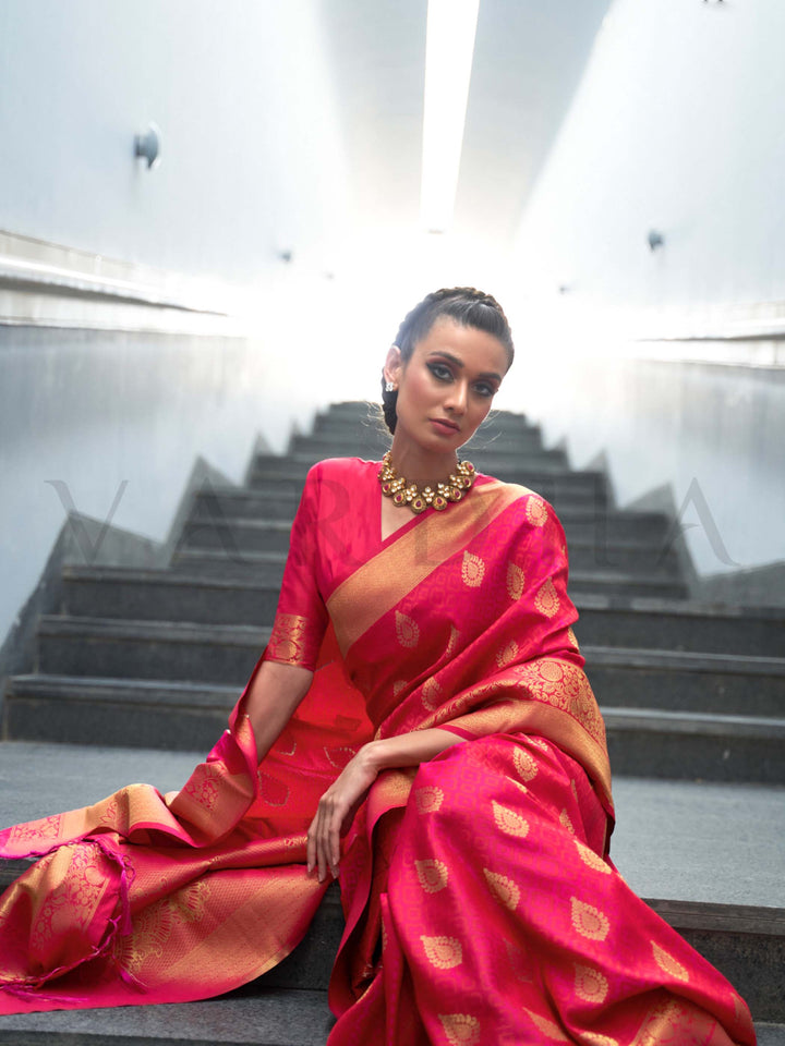This Crimson Red–Gold Satin Silk saree is crafted with intricate woven zari accents, ideal for receptions, festive wear, and ethnic elegance. A timeless drape with regal charm. SKU 179002. This Crimson Red–Gold Satin Silk saree is crafted with intricate woven zari accents, ideal for receptions, festive wear, and ethnic elegance. A timeless drape with regal charm. SKU 179002.