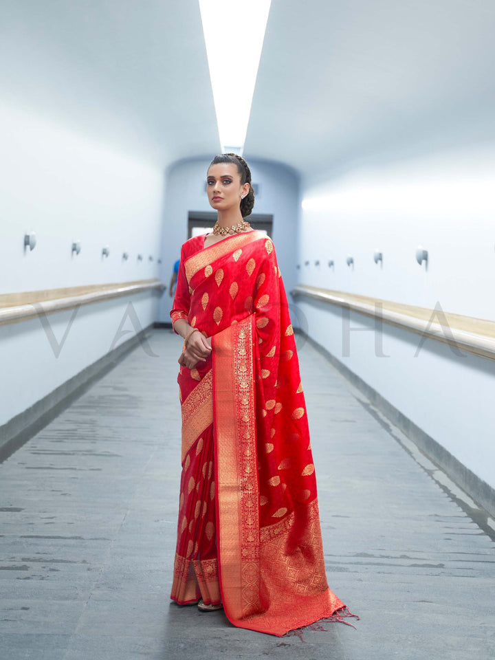 This Vermilion Red–Orange Satin Silk saree is crafted with intricate woven zari accents, ideal for receptions, festive wear, and ethnic elegance. A timeless drape with regal charm. SKU 179004. This Vermilion Red–Orange Satin Silk saree is crafted with intricate woven zari accents, ideal for receptions, festive wear, and ethnic elegance. A timeless drape with regal charm. SKU 179004.
