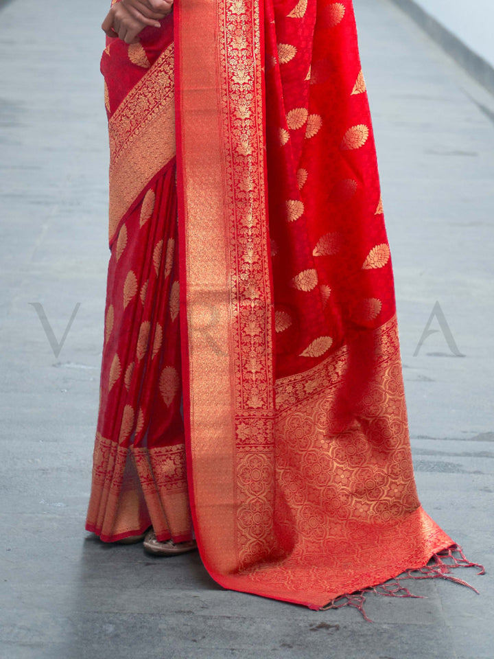 This Vermilion Red–Orange Satin Silk saree is crafted with intricate woven zari accents, ideal for receptions, festive wear, and ethnic elegance. A timeless drape with regal charm. SKU 179004. This Vermilion Red–Orange Satin Silk saree is crafted with intricate woven zari accents, ideal for receptions, festive wear, and ethnic elegance. A timeless drape with regal charm. SKU 179004.