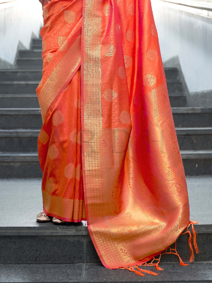 This Orange–Gold Satin Silk saree is crafted with intricate woven zari accents, ideal for receptions, festive wear, and ethnic elegance. A timeless drape with regal charm. SKU 179006. This Orange–Gold Satin Silk saree is crafted with intricate woven zari accents, ideal for receptions, festive wear, and ethnic elegance. A timeless drape with regal charm. SKU 179006.