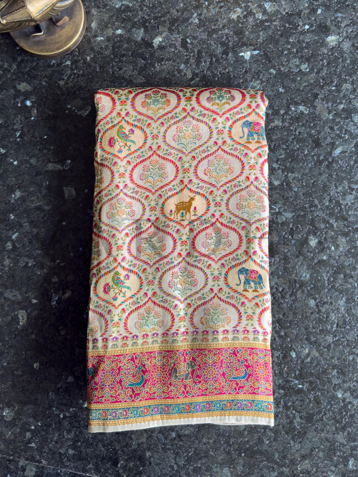 Saree with intricate patterns on a dark surface