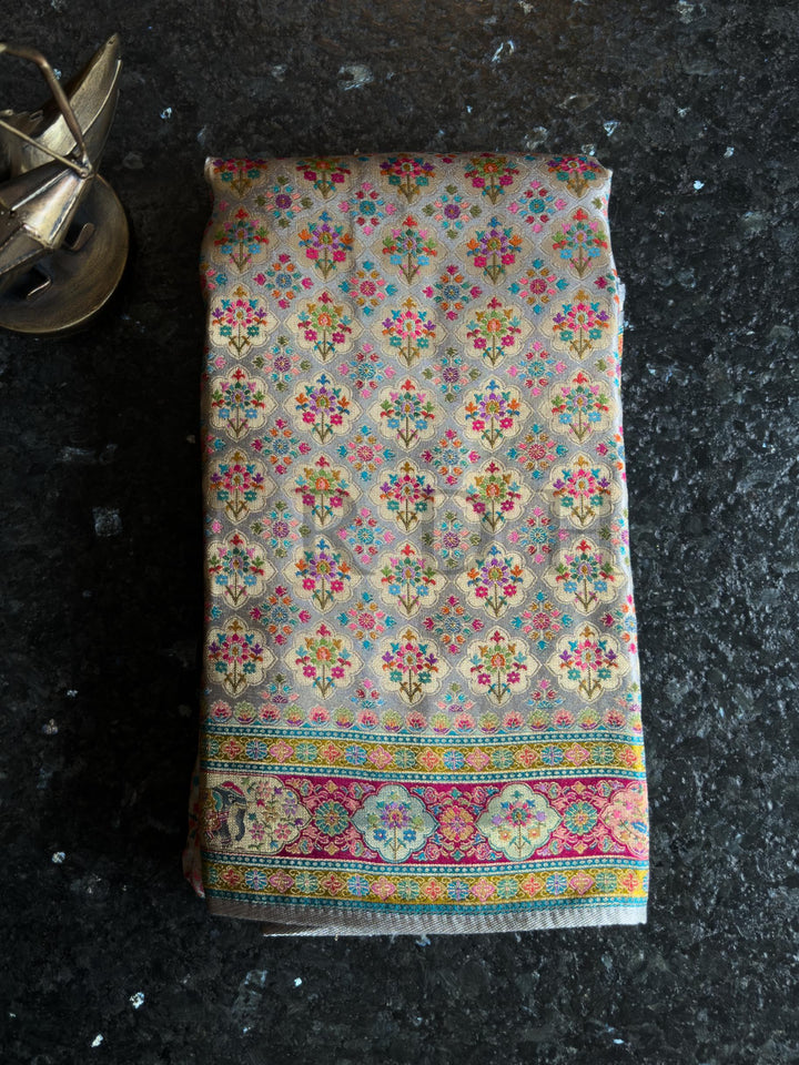 Colorful patterned fabric on a dark surface