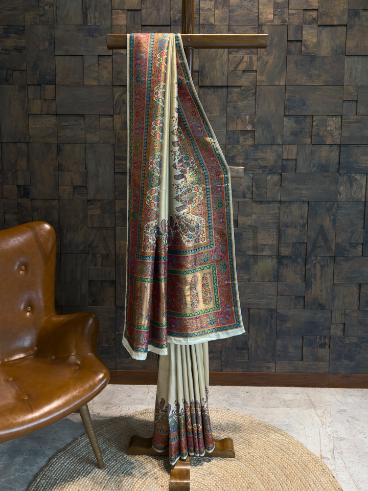 Cream Banarasi Katan Silk Saree with Zari Peacock Motifs and Paisley Pallu