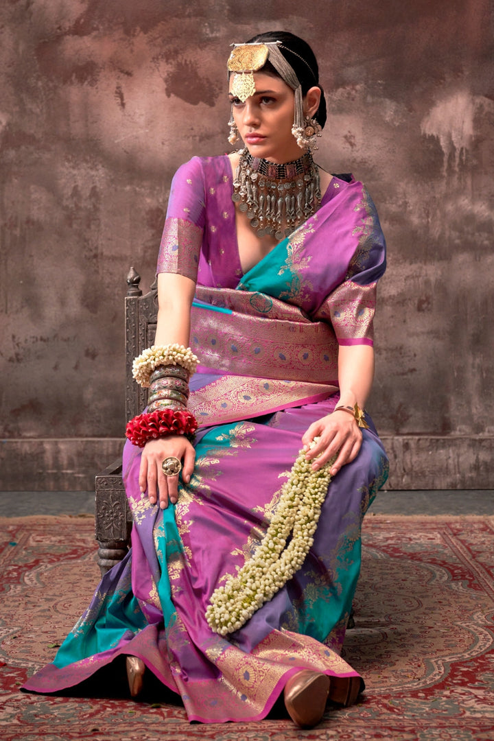 Purple and Aqua Blue Rangkaat silk saree with temple borders, intricate zari pallu, and traditional wedding styling. Handloom drape perfect for wedding functions and south indian muhurtham, styled with mogra, antique jewelry, and regal stance. This image captures the pleats close-up showing symmetry, color blending, and craftsmanship, ideal for visualizing festive elegance, designer appeal, and modern styling inspiration. Perfect for online shoppers seeking detailed previews before purchase, enhancing saree