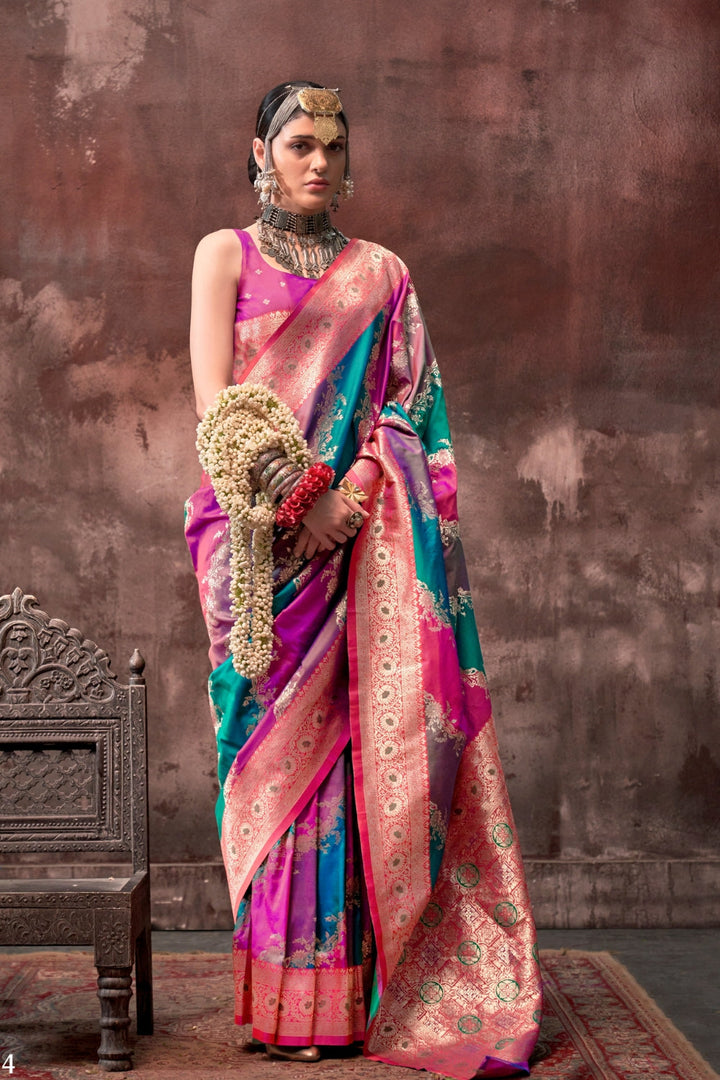 Fuchsia and Teal Blue Rangkaat silk saree with temple borders, intricate zari pallu, and traditional wedding styling. Handloom drape perfect for bollywood functions and magazine shoot, styled with mogra, antique jewelry, and regal stance. This image captures the front drape view highlighting pallu fall and pleats alignment, ideal for visualizing festive elegance, designer appeal, and modern styling inspiration. Perfect for online shoppers seeking detailed previews before purchase, enhancing saree visual mer