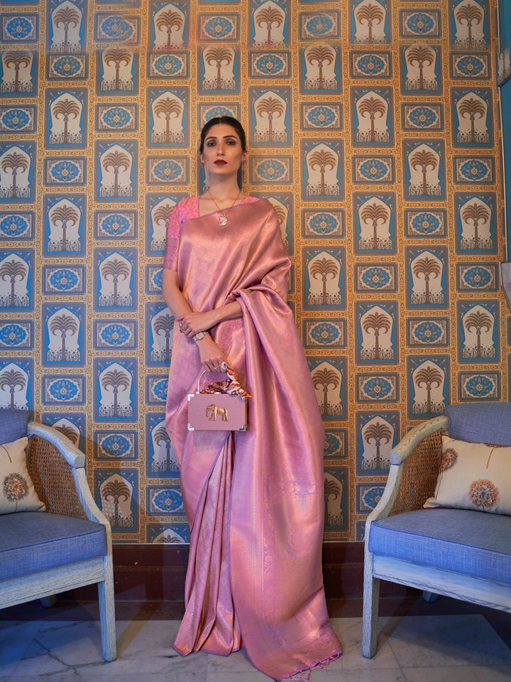 Blush Pink–Rose Gold silk saree with woven zari motifs and kanjivaram texture, ideal for weddings. Elegant Blush Pink–Rose Gold kanjivaram silk saree featuring gold/silver threadwork and festive pallu.