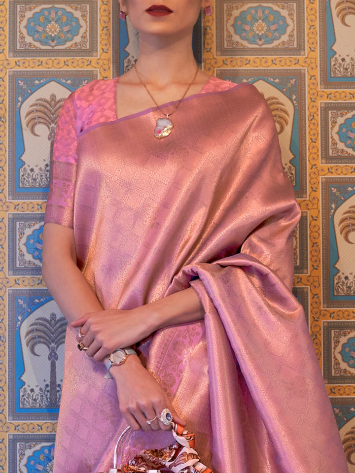 Stylish Blush Pink–Rose Gold kanjivaram with woven borders and jacquard design for ethnic events. Traditional Blush Pink–Rose Gold silk saree styled with soft zari pallu and unstitched blouse.