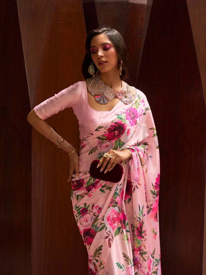 This Blush Pink–Rose Satin Crepe saree showcases stunning digital floral print that enhances its party-ready drape. Digitally crafted floral elegance for day-to-night ethnic wear. SKU 260002. This Blush Pink–Rose Satin Crepe saree showcases stunning digital floral print that enhances its party-ready drape. Digitally crafted floral elegance for day-to-night ethnic wear. SKU 260002.