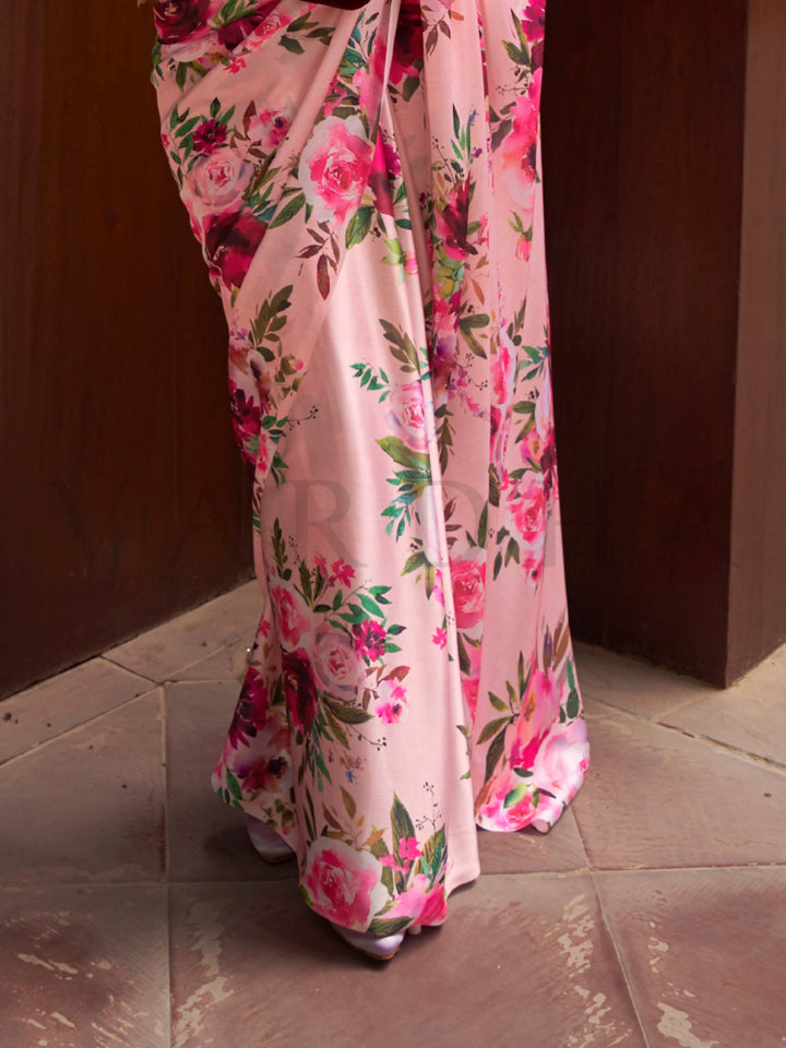 This Blush Pink–Rose Satin Crepe saree showcases stunning digital floral print that enhances its party-ready drape. Digitally crafted floral elegance for day-to-night ethnic wear. SKU 260002. This Blush Pink–Rose Satin Crepe saree showcases stunning digital floral print that enhances its party-ready drape. Digitally crafted floral elegance for day-to-night ethnic wear. SKU 260002.