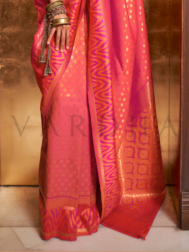 This luxurious Coral Peach–Rose Pink Kanjivaram Silk saree features classic woven zari work with contrast pallu and ornate detailing. Elegant wedding attire with heritage style and timeless drape. SKU 271007. This luxurious Coral Peach–Rose Pink Kanjivaram Silk saree features classic woven zari work with contrast pallu and ornate detailing. Elegant wedding attire with heritage style and timeless drape. SKU 271007.