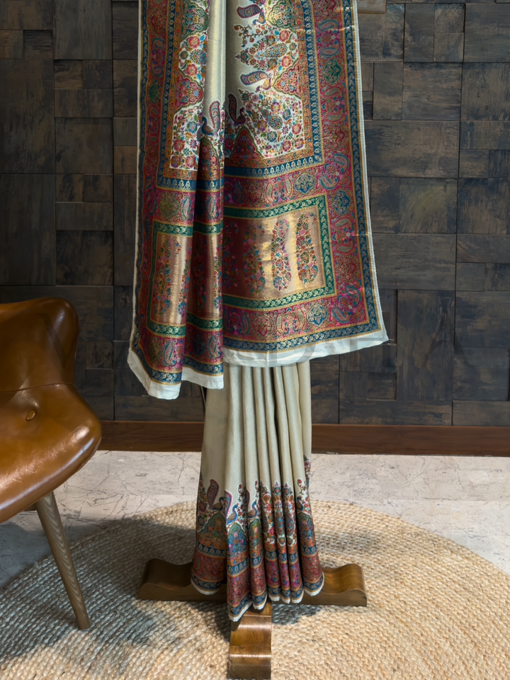 Cream Banarasi Katan Silk Saree with Zari Peacock Motifs and Paisley Pallu