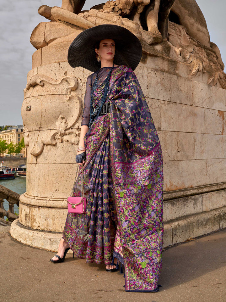Midnight Navy organza parsi silk saree with intricate multicolor thread floral embroidery and handloom craftsmanship, ideal for bollywood and styled perfectly for premiere night elegance and fashion-forward flair. This image captures the front drape view highlighting pallu fall and pleats alignment, ideal for visualizing festive elegance, designer appeal, and modern styling inspiration. Perfect for online shoppers seeking detailed previews before purchase, enhancing saree visual merchandising and SEO-rich p