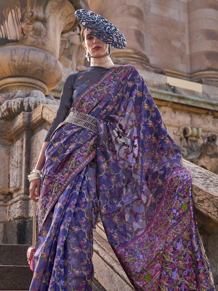 Royal Violet organza parsi silk saree with intricate multicolor thread floral embroidery and handloom craftsmanship, ideal for bollywood and styled perfectly for ramp walk look elegance and fashion-forward flair. This image captures the model styling perspective with complete saree ensemble displayed, ideal for visualizing festive elegance, designer appeal, and modern styling inspiration. Perfect for online shoppers seeking detailed previews before purchase, enhancing saree visual merchandising and SEO-rich