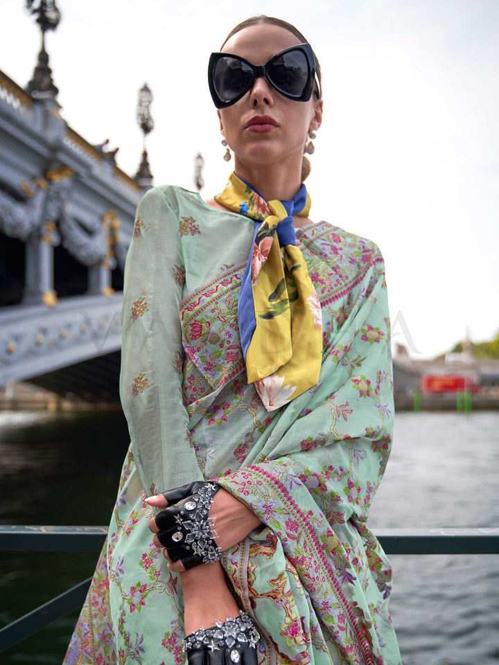 Seafoam Mint organza parsi silk saree with intricate multicolor thread floral embroidery and handloom craftsmanship, ideal for party-wear and styled perfectly for garden function elegance and fashion-forward flair. This image captures the model styling perspective with complete saree ensemble displayed, ideal for visualizing festive elegance, designer appeal, and modern styling inspiration. Perfect for online shoppers seeking detailed previews before purchase, enhancing saree visual merchandising and SEO-ri