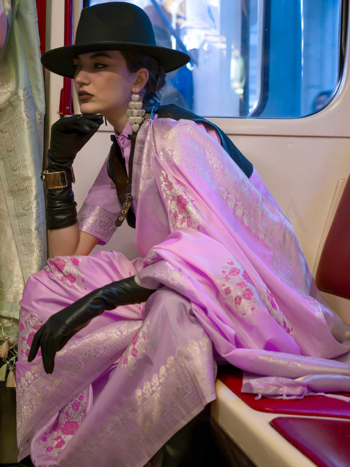 Lavender Lilac silk saree with Rose Gold zari and Pink Fuchsia floral motifs, styled with contrast blouse, handloom weaving, festive-ready look with cinematic silhouette and bold accessories — ideal for events and grand celebrations. This image captures the model styling perspective with complete saree ensemble displayed, ideal for visualizing festive elegance, designer appeal, and modern styling inspiration. Perfect for online shoppers seeking detailed previews before purchase, enhancing saree visual merch