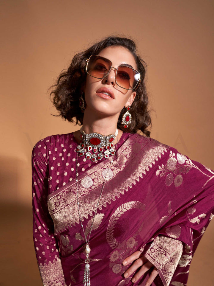 The soft, sheer fall of georgette is visible as it cascades over the shoulder in a natural pleated arrangement, highlighting its lightness and fluidity