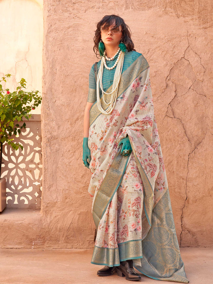 This Ivory Beige–Olive Green FeatherSoft saree features stunning printed floral work with floral detailing and grid textures, ideal for festive evenings and cocktail-ready styling. Designed for lightweight elegance and statement draping. SKU 376004. This Ivory Beige–Olive Green FeatherSoft saree features stunning printed floral work with floral detailing and grid textures, ideal for festive evenings and cocktail-ready styling. Designed for lightweight elegance and statement draping. SKU 376004.