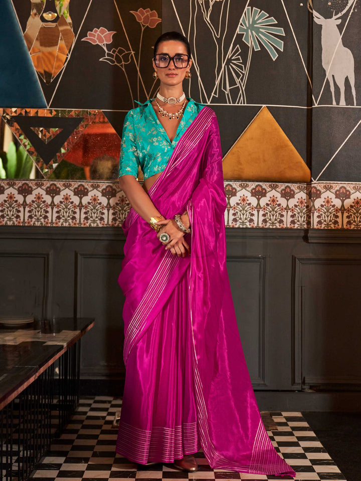 Styled with a matching heavy viscose blouse that adds structure and contrast to the drape, this saree is perfect for evening receptions, Diwali parties, or traditional engagements