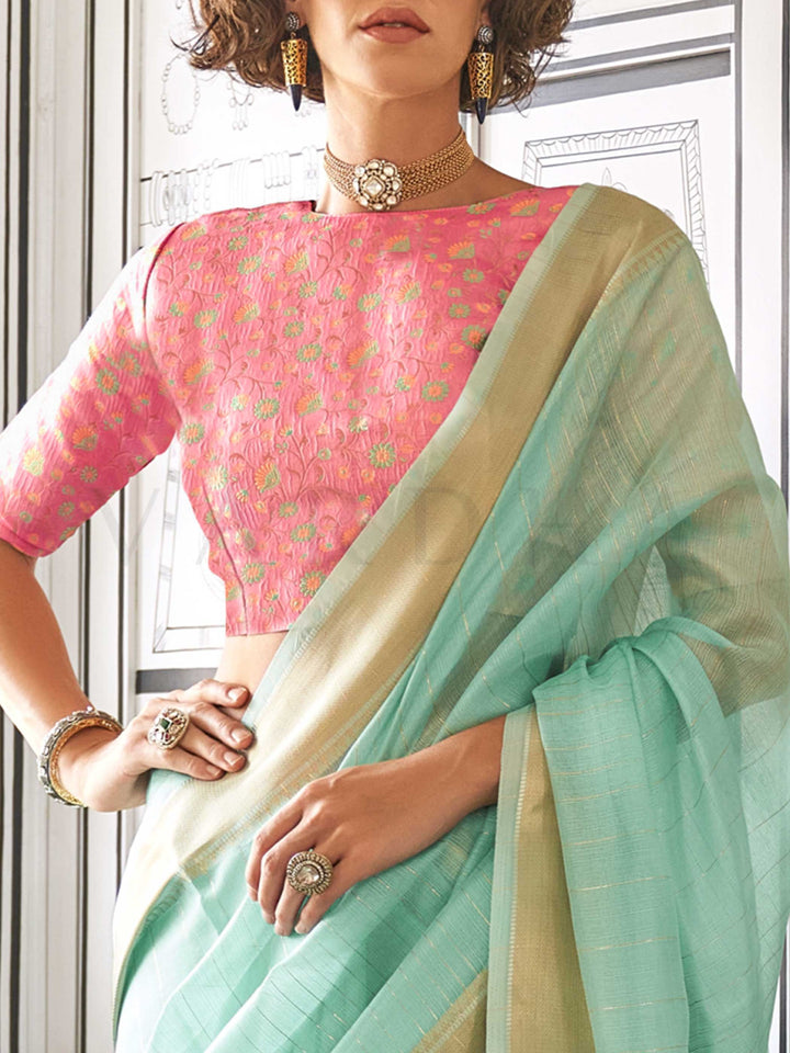 Mint Green moss chiffon saree styled for front profile This image captures the zoomed texture view illustrating fabric weave and print clarity, ideal for visualizing festive elegance, designer appeal, and modern styling inspiration. Perfect for online shoppers seeking detailed previews before purchase, enhancing saree visual merchandising and SEO-rich product display strategy.