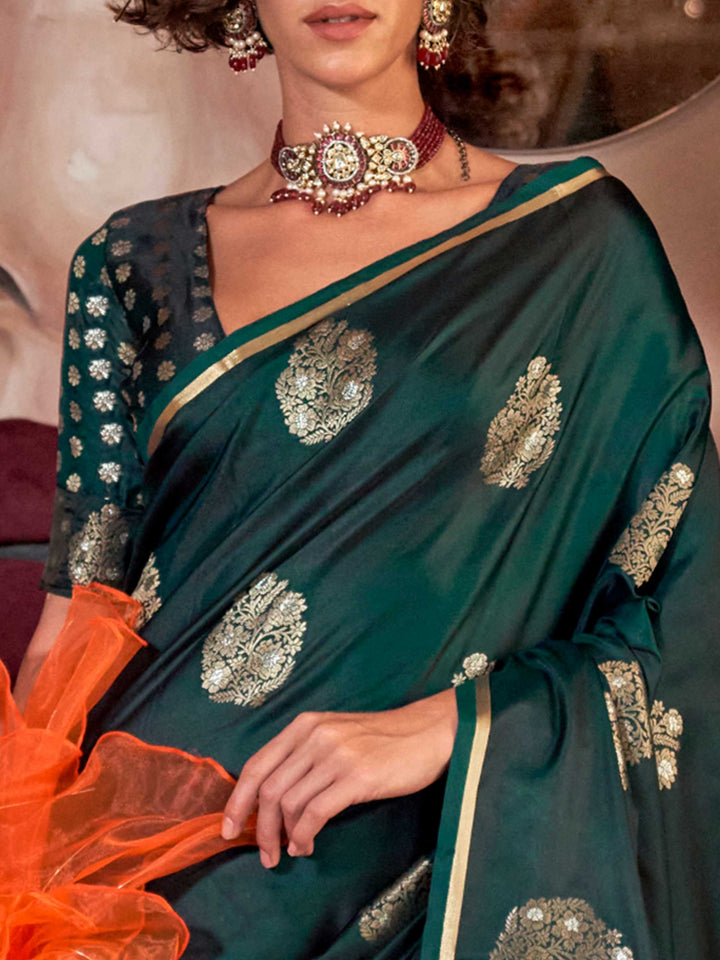 Rich zari motif silk saree in handloom satin fabric, styled with ethnic blouse – elegant ethnic wear This image captures the zoomed texture view illustrating fabric weave and print clarity, ideal for visualizing festive elegance, designer appeal, and modern styling inspiration. Perfect for online shoppers seeking detailed previews before purchase, enhancing saree visual merchandising and SEO-rich product display strategy.