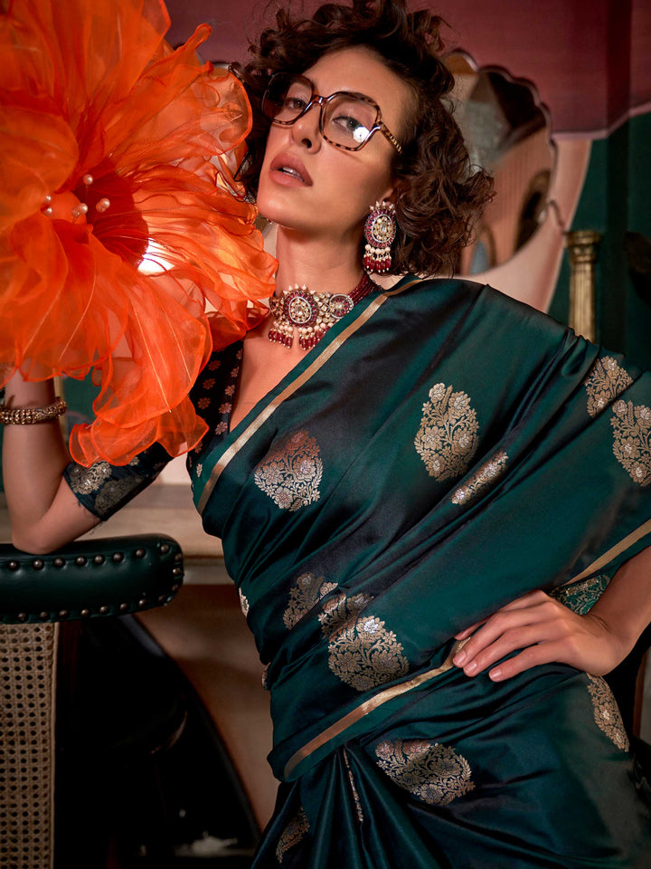 Rich zari motif silk saree in handloom satin fabric, styled with ethnic blouse – elegant ethnic wear This image captures the pleats close-up showing symmetry, color blending, and craftsmanship, ideal for visualizing festive elegance, designer appeal, and modern styling inspiration. Perfect for online shoppers seeking detailed previews before purchase, enhancing saree visual merchandising and SEO-rich product display strategy.