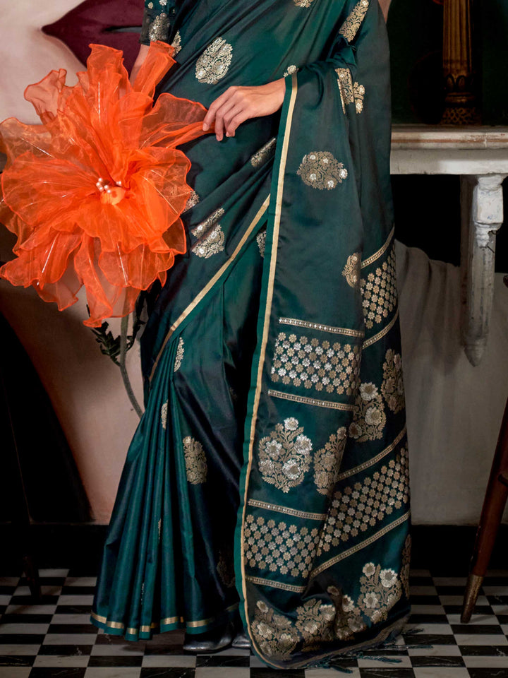 Rich zari motif silk saree in handloom satin fabric, styled with ethnic blouse – elegant ethnic wear This image captures the back drape focus revealing pallu finesse and motif richness, ideal for visualizing festive elegance, designer appeal, and modern styling inspiration. Perfect for online shoppers seeking detailed previews before purchase, enhancing saree visual merchandising and SEO-rich product display strategy.