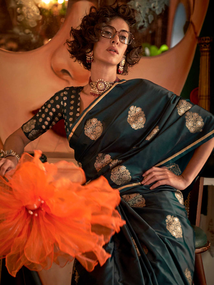 Rich zari motif silk saree in handloom satin fabric, styled with ethnic blouse – elegant ethnic wear This image captures the model styling perspective with complete saree ensemble displayed, ideal for visualizing festive elegance, designer appeal, and modern styling inspiration. Perfect for online shoppers seeking detailed previews before purchase, enhancing saree visual merchandising and SEO-rich product display strategy.