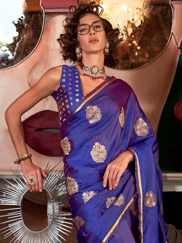 Royal Blue satin handloom silk saree with intricate brocade pallu, perfect for weddings and festive occasions This image captures the side angle view showcasing blouse styling and zari border detail, ideal for visualizing festive elegance, designer appeal, and modern styling inspiration. Perfect for online shoppers seeking detailed previews before purchase, enhancing saree visual merchandising and SEO-rich product display strategy.