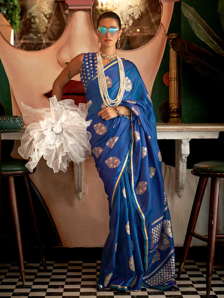 Sapphire Blue satin handloom silk saree with intricate brocade pallu, perfect for weddings and festive occasions This image captures the front drape view highlighting pallu fall and pleats alignment, ideal for visualizing festive elegance, designer appeal, and modern styling inspiration. Perfect for online shoppers seeking detailed previews before purchase, enhancing saree visual merchandising and SEO-rich product display strategy.