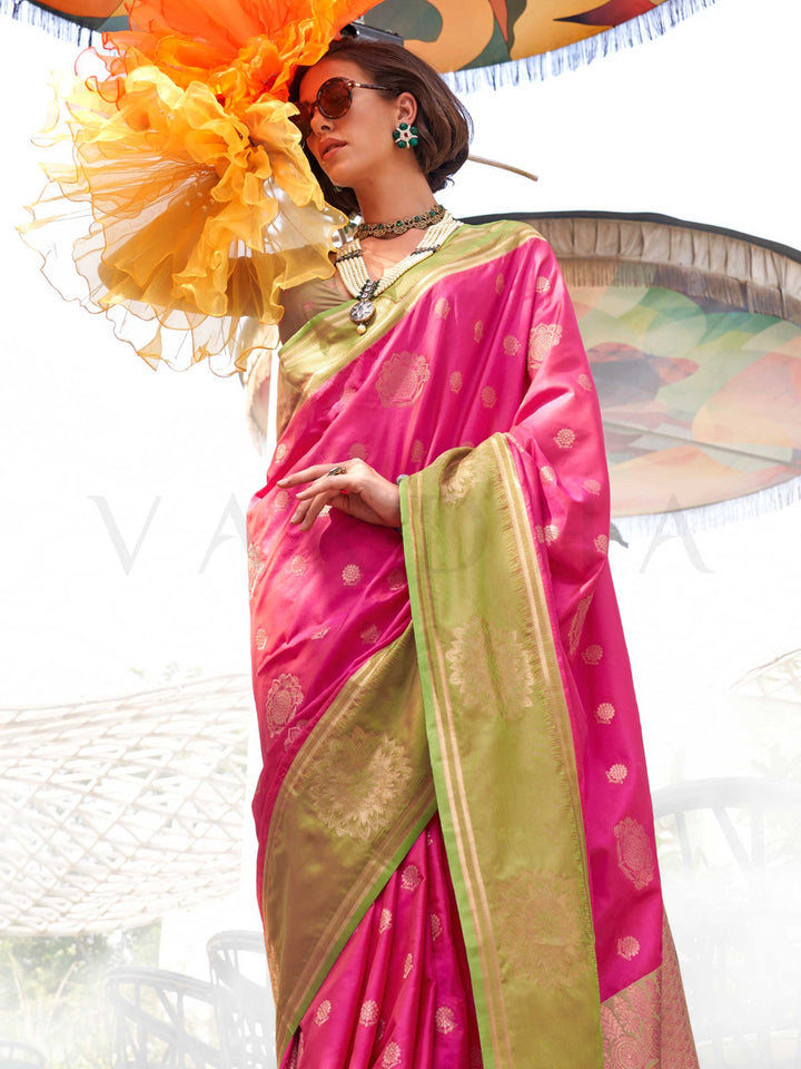 Elegant Rani Pink–Leaf Green silk saree with jacquard weave and mandala inspired border detailing. Rani Pink–Leaf Green saree for weddings and sangeet, finished with artistic zari craftsmanship and rich drape.