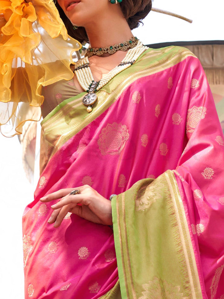 Charming Rani Pink–Leaf Green satin saree with textured pallu and timeless weaving artistry. Traditional-meets-modern in this Rani Pink–Leaf Green saree with zari borders and vibrant festival palette.