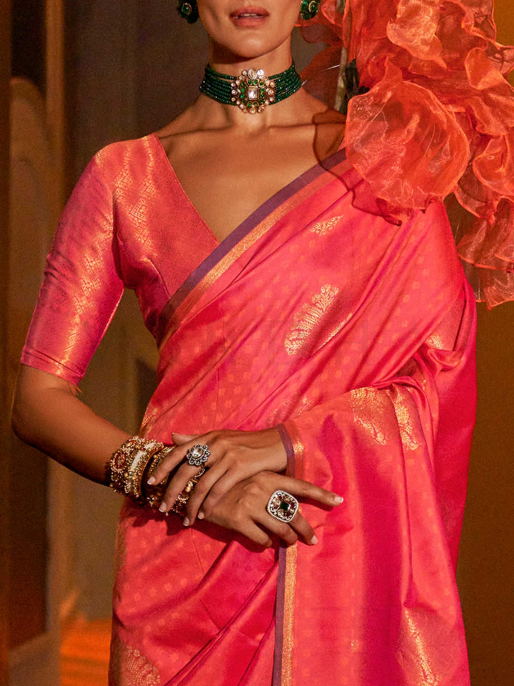 Peacock Blue–Gold silk saree photographed in heritage setting with antique floor and floral wallpaper. Back fall view showing the dramatic zari pallu and matched blouse of Peacock Blue–Gold saree..