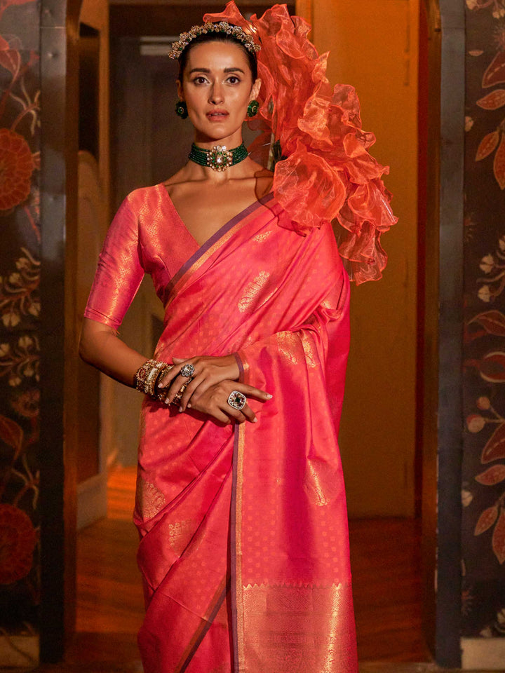 Soft satin silk texture and pleats of Peacock Blue–Gold saree flowing into zari-drenched pallu. Close-up of zari woven motifs on Peacock Blue–Gold banarasi saree with luxurious sheen..