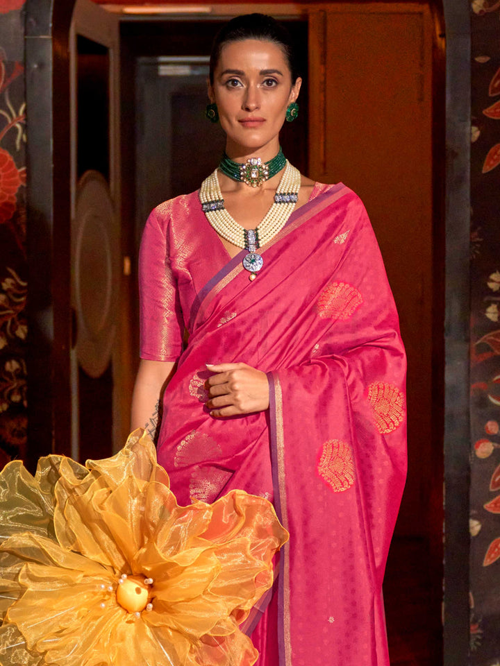 Soft satin silk texture and pleats of Purple–Rose Gold saree flowing into zari-drenched pallu. Close-up of zari woven motifs on Purple–Rose Gold banarasi saree with luxurious sheen..