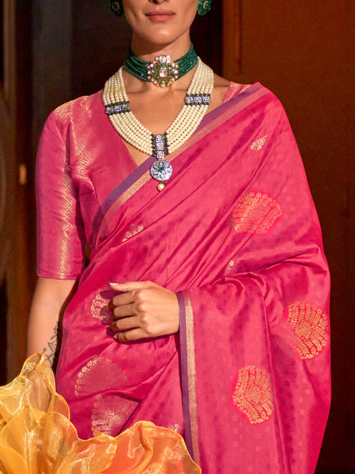 Purple–Rose Gold silk saree photographed in heritage setting with antique floor and floral wallpaper. Back fall view showing the dramatic zari pallu and matched blouse of Purple–Rose Gold saree..