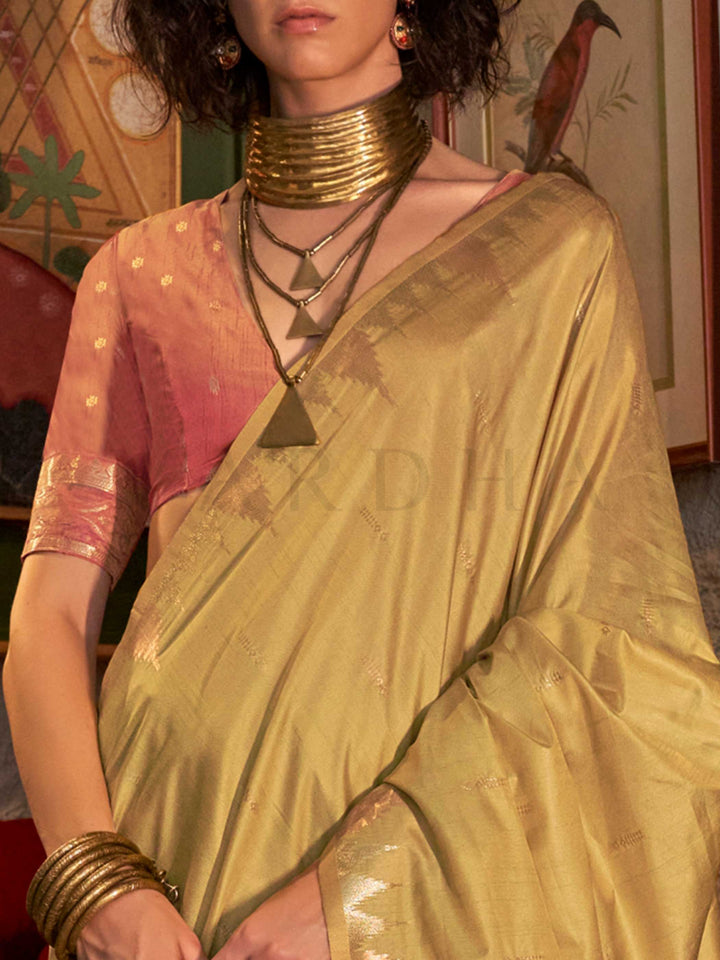 Pistachio Green–Rose Pink feathersoft raw silk saree featuring banarasi ikat design, ideal for sangeet night and festive evening wear with rich texture and contrast blouse. Pistachio Green–Rose Pink feathersoft raw silk saree featuring banarasi ikat design, ideal for sangeet night and festive evening wear with rich texture and contrast blouse..