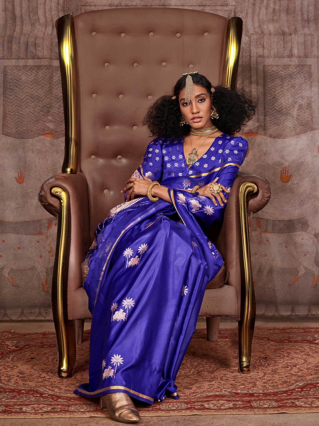 Royal Blue–Silver satin silk saree with jacquard woven motifs and floral zari detailing. Perfect partywear or reception look with embroidered blouse and traditional drape, ideal for festive fashion styling. Royal Blue–Silver satin silk saree with jacquard woven motifs and floral zari detailing. Perfect partywear or reception look with embroidered blouse and traditional drape, ideal for festive fashion styling..