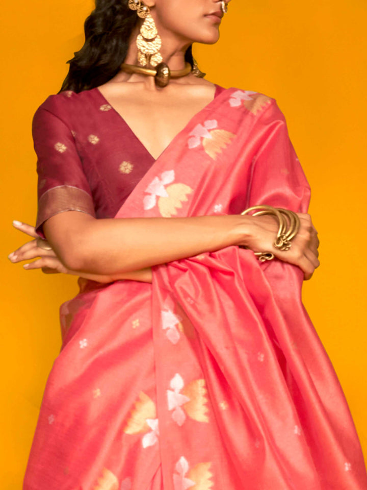 Watermelon Pink–Wine Red feathersoft tussar silk saree featuring woven lotus motifs and soft pallu, styled for festive rituals with a breathable finish. Watermelon Pink–Wine Red feathersoft tussar silk saree featuring woven lotus motifs and soft pallu, styled for festive rituals with a breathable finish..