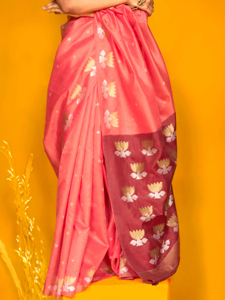 Watermelon Pink–Wine Red feathersoft tussar silk saree featuring woven lotus motifs and soft pallu, styled for festive rituals with a breathable finish. Watermelon Pink–Wine Red feathersoft tussar silk saree featuring woven lotus motifs and soft pallu, styled for festive rituals with a breathable finish..