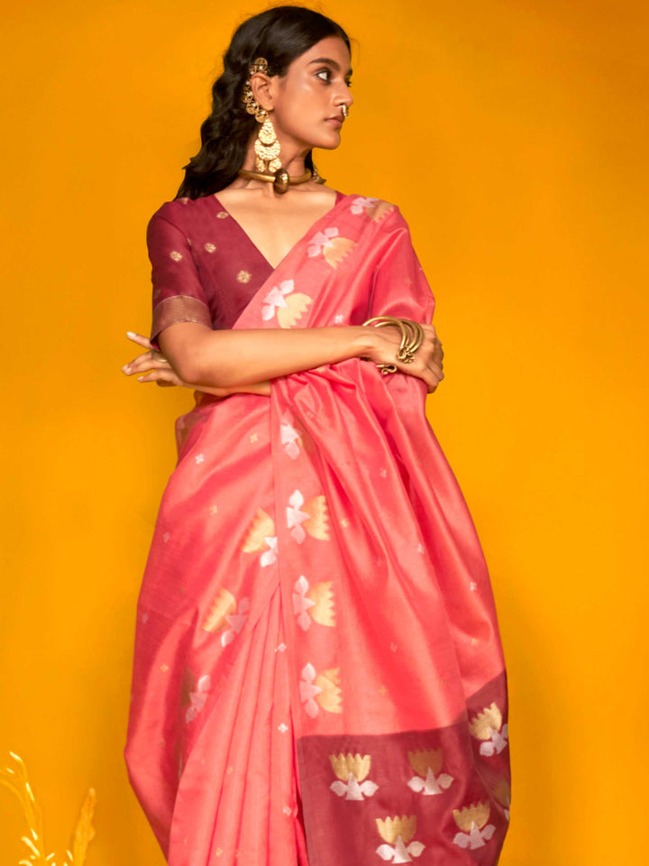 Watermelon Pink–Wine Red feathersoft tussar silk saree featuring woven lotus motifs and soft pallu, styled for festive rituals with a breathable finish. Watermelon Pink–Wine Red feathersoft tussar silk saree featuring woven lotus motifs and soft pallu, styled for festive rituals with a breathable finish..