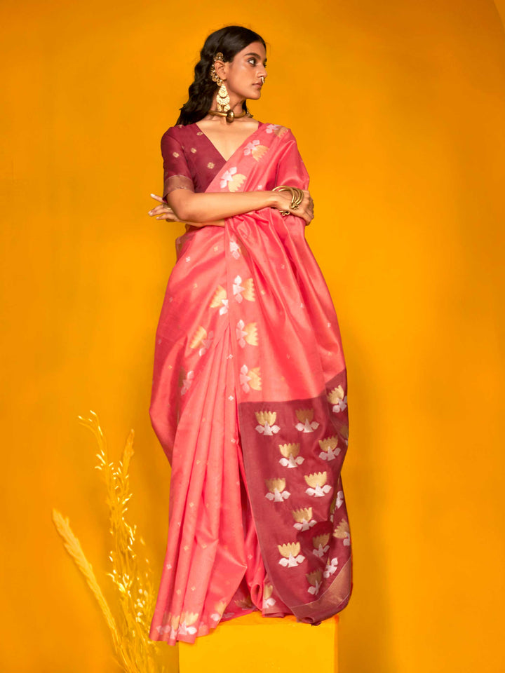 Watermelon Pink–Wine Red feathersoft tussar silk saree featuring woven lotus motifs and soft pallu, styled for festive rituals with a breathable finish. Watermelon Pink–Wine Red feathersoft tussar silk saree featuring woven lotus motifs and soft pallu, styled for festive rituals with a breathable finish..