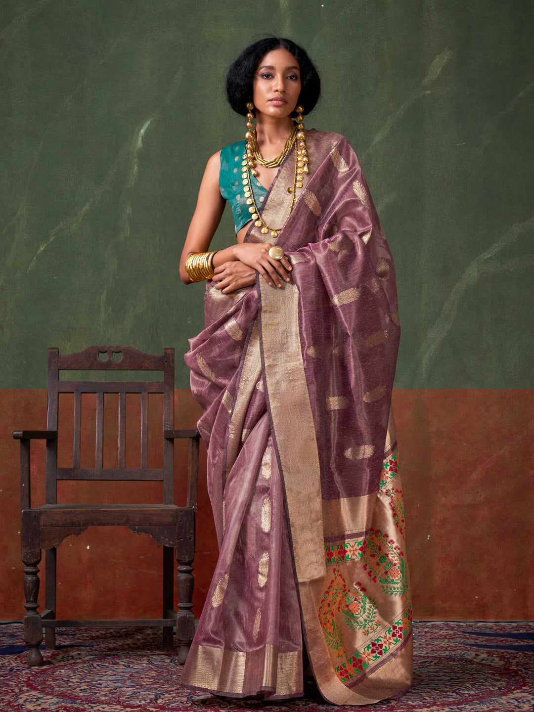 Korra Signature Paithani Zari Tissue Saree – Handloom Weaving for Weddings & Festive Wear, Elevate your ethnic look with the Korra Signature Paithani Zari Tissue Saree. A masterpiece in handloom weaving, featuring luxurious zari work & a rich pallu. Ideal for weddings & special occasions.