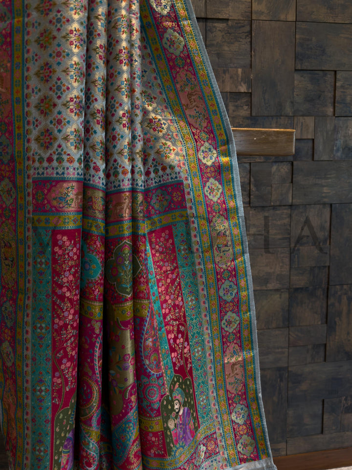 Colorful patterned fabric draped over a wooden surface