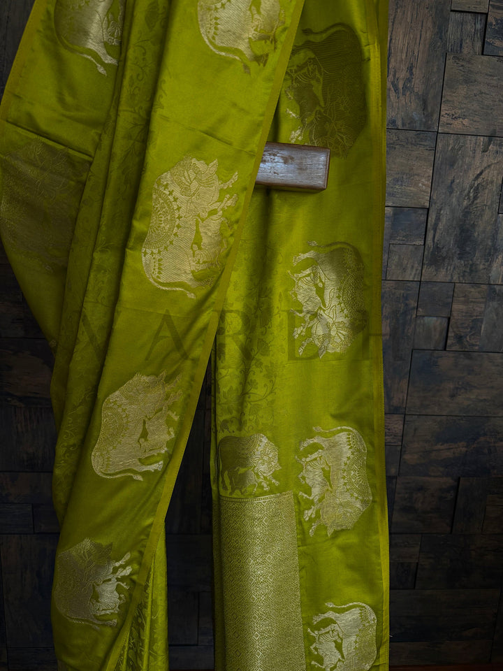 Daywear satin saree in fresh green with elegant border design