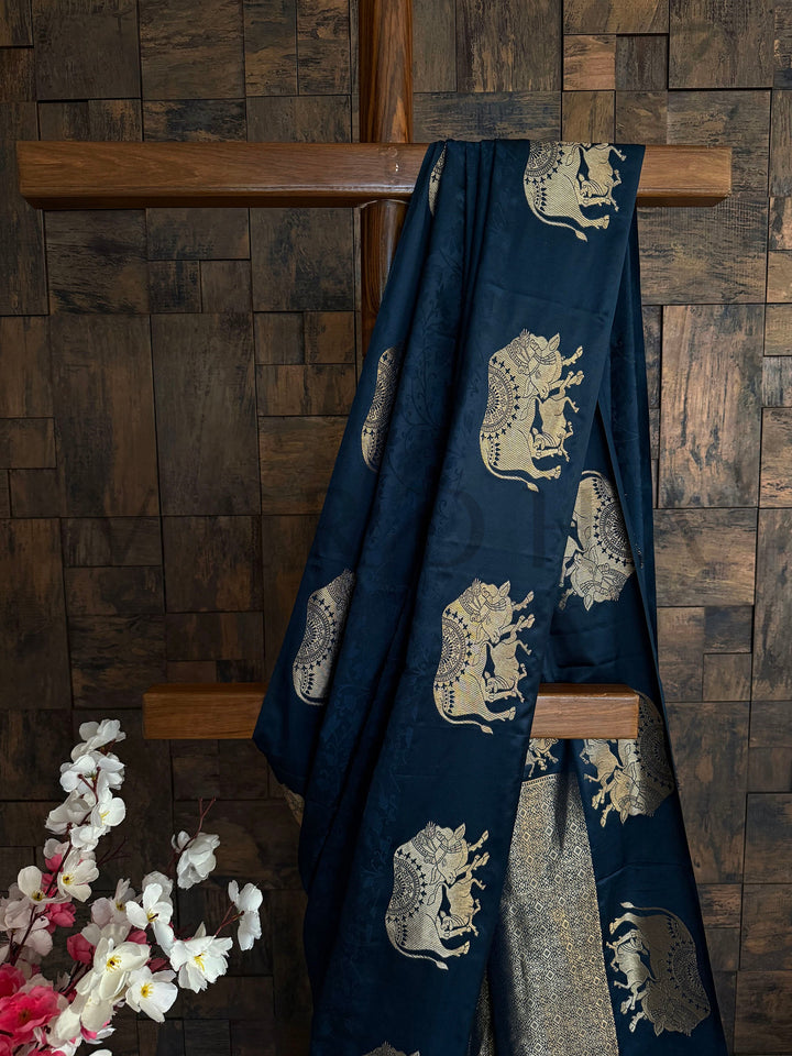 Luxurious satin saree with golden zari elephant work and unstitched blouse