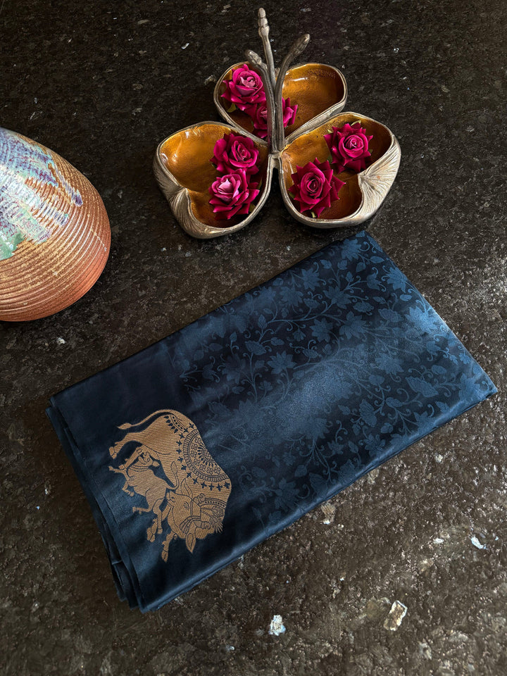 Elegant midnight blue ethnic saree with intricate border and pallu