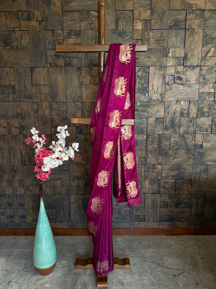 Royal magenta satin saree with rose gold zari elephant woven motifs
