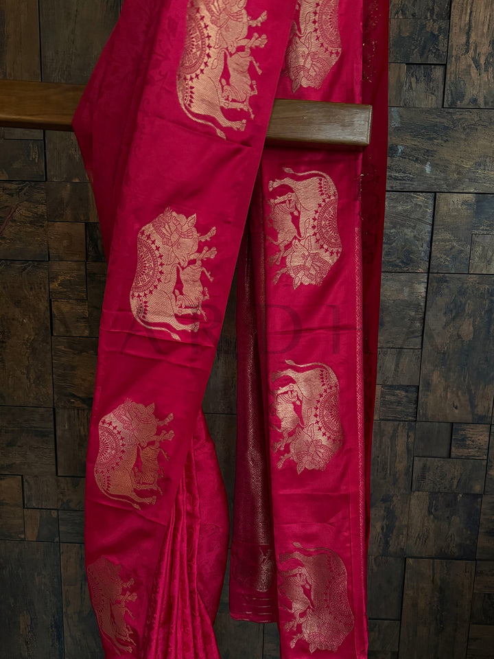 Soft satin saree in deep red for festive and cultural wear